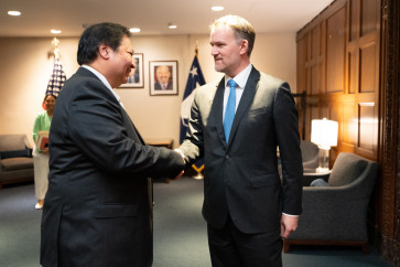Coordinating Economy Minister Airlangga Hartarto (left) shakes hands with United States Trade Representative (USTR) head Jamieson Greer following a meeting on reciprocal tariff policy in Washington on July 10, 2025.
