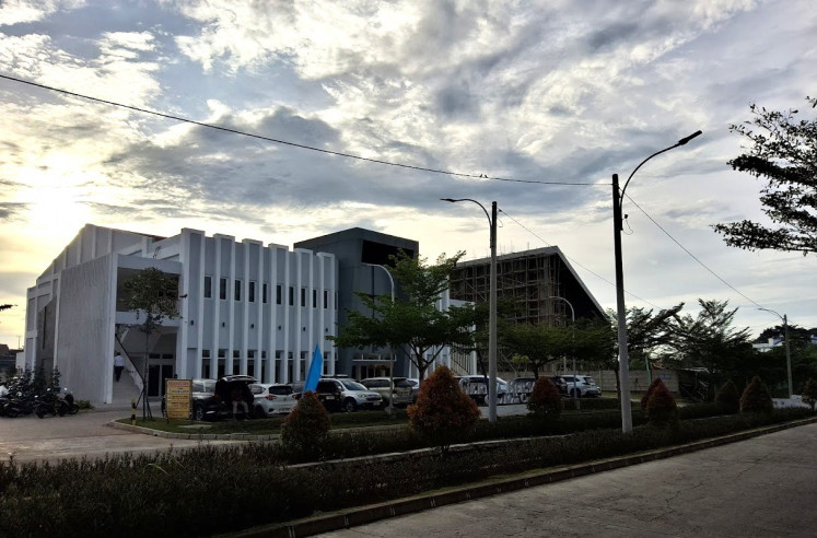 Church for all: Cars are parked outside the new Gereja Bersama Protestant Church in Citra Maja City housing complex in Lebak regency, Banten, on Dec. 7, 2025. Religious Affairs Minister Nasaruddin Umar inaugurated the church for various denominations in September of this year. 