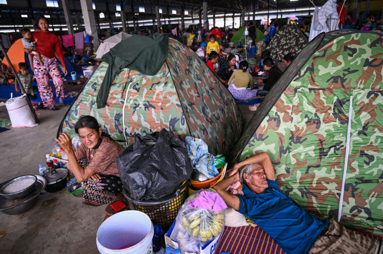 Uneasy rest: People displaced by renewed clashes along the border with Thailand take shelter on Dec. 14, 2025 at a temporary camp in Banteay Meanchey province, Cambodia.