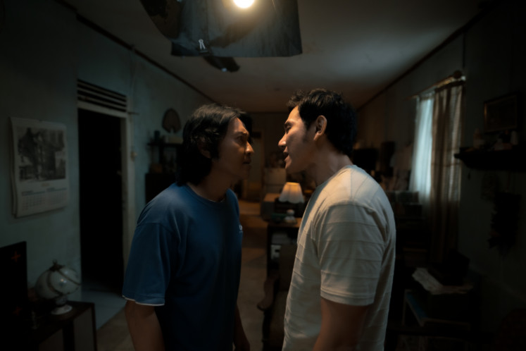 Brotherly rift: The beating heart of the comedy film 'Lupa Daratan' lies in the estranged relationship between Vino Agustian (right) and his older brother, Iksan.