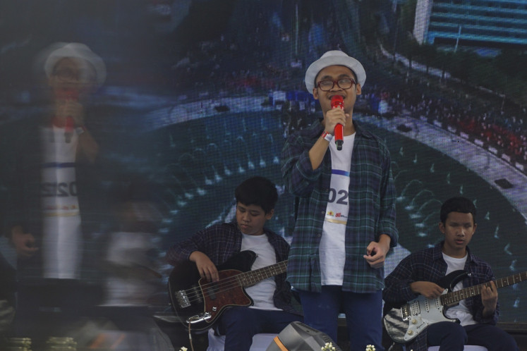 A street musician group performs during an audition for the Street Busker Music Festival at Lapangan Banteng in Jakarta on Nov. 29, 2025.