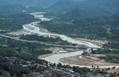 Flood fury: Riverbank areas affected by flash floods are seen on Dec. 21, 2025, in Padang Pariaman, West Sumatra. 