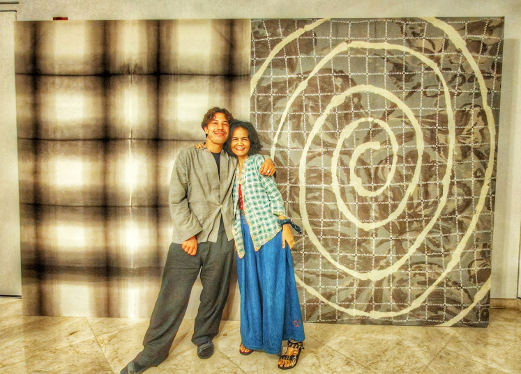 Interwoven path: Dutch artist Nazif Lopulissa (left) and Studio Sejauh founder Chitra Subyakto pose before a textile work displayed in their joint exhibition, State of Fashion: Perspectives On&hellip; Weaving Threads, which runs until Dec. 24, 2025, at Erasmus Huis Jakarta.
