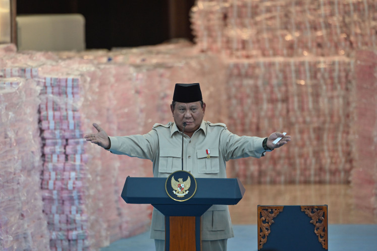 President Prabowo Subianto delivers a speech on Dec. 24 during a ceremony for the handover of funds collected from forestry administrative fines and recovered state assets from corruption cases at the Attorney General&rsquo;s Office complex in Jakarta. 
