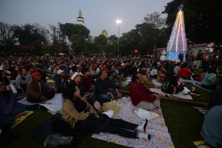 People attend a Christmas service on Dec. 25 at Pancasila Square in Salatiga, Central Java.