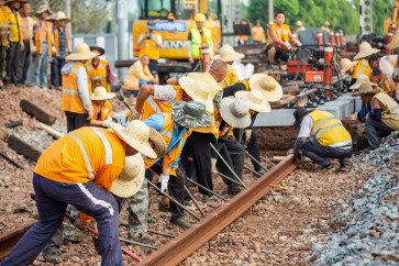 Workers construct a railway line in Haian, in China's eastern Jiangsu province in this file photo taken on Aug. 9, 2023.