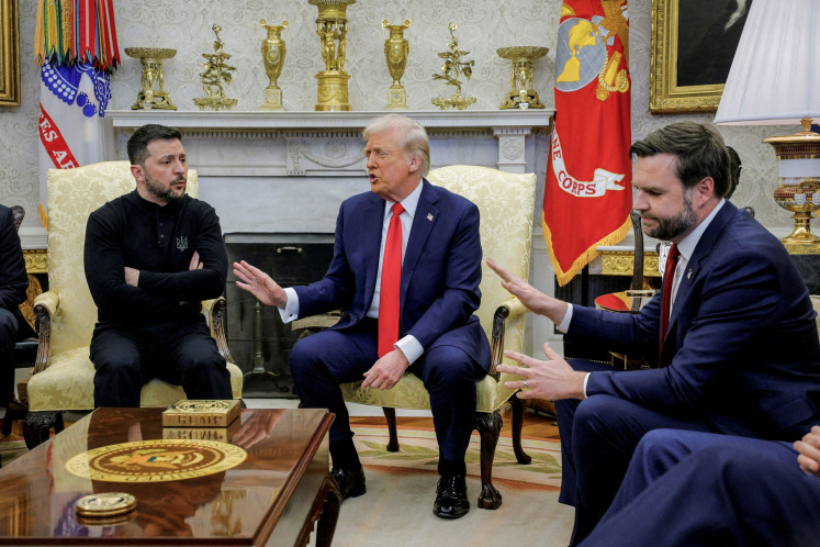 United States President Donald Trump (center) meets with Ukrainian President Volodymyr Zelenskiy (left) as US Vice President JD Vance (right) reacts at the White House in Washington, D.C., the US, on Feb. 28, 2025. 