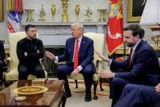 United States President Donald Trump (center) meets with Ukrainian President Volodymyr Zelenskiy (left) as US Vice President JD Vance (right) reacts at the White House in Washington, D.C., the US, on Feb. 28, 2025. 