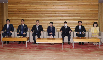 Japan's Prime Minister Sanae Takaichi (center) and other cabinet members attend a cabinet meeting at the Prime Minister's office in Tokyo on Dec. 26, 2026.
