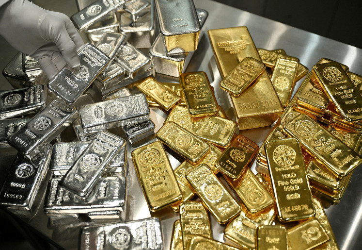 Gold and silver bars are piled up in the safe deposit boxes room of the Pro Aurum gold house in Munich, Germany, on Jan. 10, 2025.