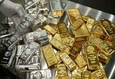 Gold and silver bars are piled up in the safe deposit boxes room of the Pro Aurum gold house in Munich, Germany, on Jan. 10, 2025.