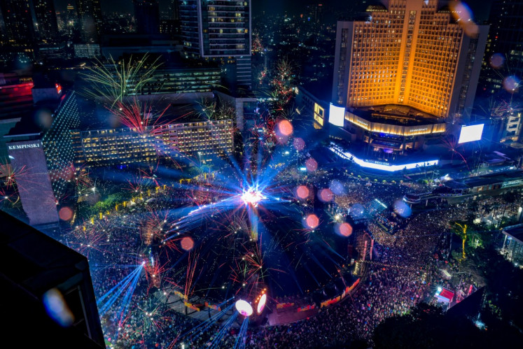 Fireworks light up the midnight sky during 2026 New Year's Day celebrations in Jakarta on Jan. 1, 2026.