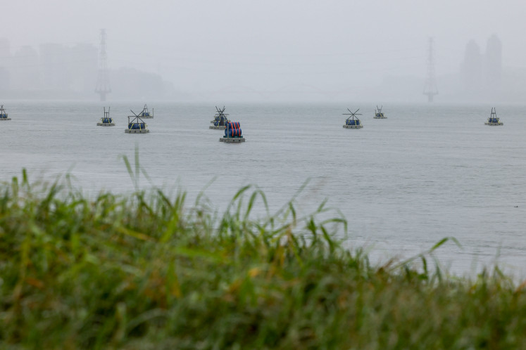 Explosive barrels placed by Taiwan military at the Tamsui River, as part of a series of emergency combat readiness drills, in response to China conducting &ldquo;Justice Mission 2025&ldquo; military drills around Taiwan, in Taipei, Taiwan, on Wednesdayy, Dec. 31, 2025. 