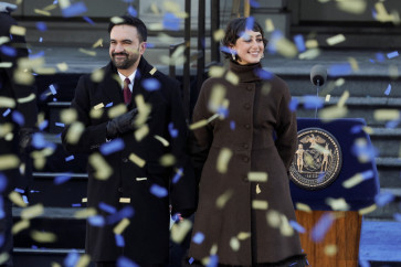New York City Mayor Zohran Mamdani (left) and his wife Rama Duwaji react as confetti falls during his inauguration ceremony in New York City, the United States, on Jan. 1, 2026.