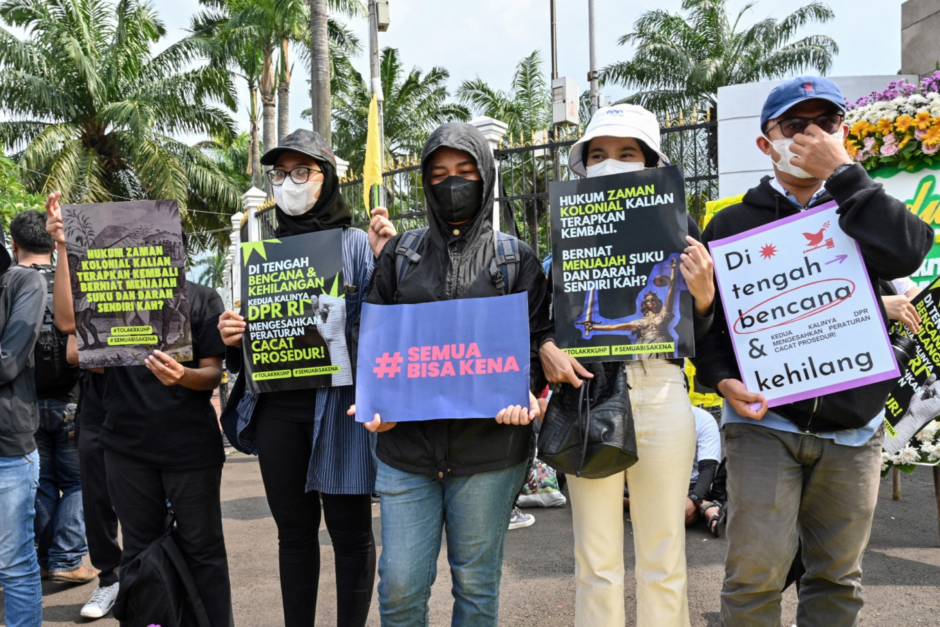 Activists hold a protest against the new Criminal Code (KUHP) on Dec. 5, 2022, outside the Senayan legislative complex in Central Jakarta . The House of Representatives passed on Dec. 6 a revision to the Criminal Code that would outlaw pre-marital sex aside from other sweeping changes to the criminal code, a move critics deemed as a setback to the country's freedoms.