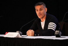 John Herdman, then head coach of Toronto FC, speaks at a press conference during a MLS media day event at the Miami Convention Center on Jan. 11, 2024 in Miami, Florida, the United States.