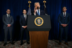 United States President Donald Trump (center), alongside (from left to right) Deputy Chief of Staff Stephen Miller, Secretary of State Marco Rubio and Secretary of Defense Pete Hegseth speaks to the press following US military actions in Venezuela at his Mar-a-Lago residence in Palm Beach, Florida, the US on Jan. 3, 2026. President Trump said Saturday that US forces had captured Venezuelan leader Nicolas Maduro after launching a &ldquo;large scale strike&ldquo; on the South American country.