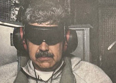 This image posted on US President Donald Trump's Truth Social account on January 3, 2026, shows what President Trump says is Venezuela's President Nicolas Maduro onboard the USS Iwo Jima after the US military captured him on January 3, 2026. 