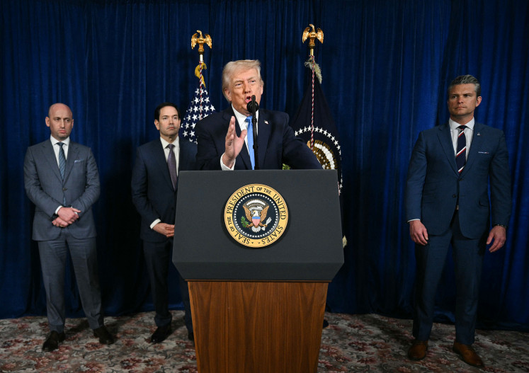 Regime change: United States President Donald Trump (second right), alongside Deputy Chief of Staff (left) Stephen Miller, US Secretary of State Marco Rubio (second left) and US Secretary of Defense Pete Hegseth, speaks to the press on Saturday, Jan. 03, 2026 following US military actions in Venezuela, at his Mar-a-Lago residence in Palm Beach, Florida.