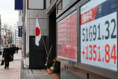 An electronic quotation board displays numbers of the Nikkei Stock Average on the Tokyo Stock Exchange in Tokyo on Jan. 5, 2026.