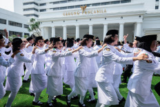 Members of the National Flag Hoisting Troop dance after the commemoration of Pancasila Day at the Pancasila Building, a historic hall within the Foreign Ministry  compound in Jakarta, on June 2, 2025. 