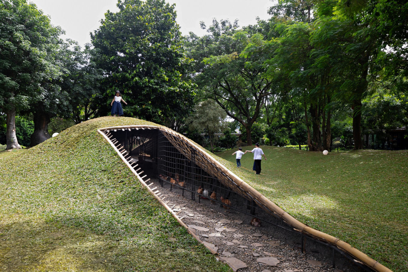 Urban farming reimagined: Chicken Hero Pavilion, a self-initiated project by RAD+ar, rises as a hilly structure in Urban Forest, South Jakarta, exploring backyard poultry farming as a design response to food waste and urban resilience.