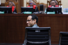 Former education minister Nadiem Makarim reacts on Jan. 5, 2026, prior to his trial in a corruption case about his involvement in the procurement of Google's Chromebook laptops for use at his ministry and by students, at the Jakarta Corruption Court. 