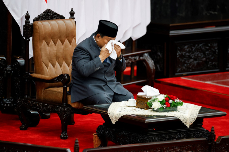 President Prabowo Subianto wipes his face on Aug. 15, 2025, moments before delivering his annual State of the Nation Address at the Senayan Legislative Complex in Central Jakarta.