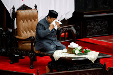 President Prabowo Subianto wipes his face on Aug. 15, 2025, moments before delivering his annual State of the Nation Address at the Senayan Legislative Complex in Central Jakarta.