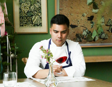 Taste session: Chef and certified sommelier Kaskara Hasibuan holds a wine glass while sitting down in this undated picture. 
