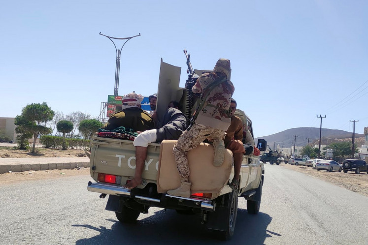 This photo taken on January 4, 2026 shows Saudi-backed forces deployed in the city of Mukalla in Yemen's coastal southern Hadramawt province. At least 80 troops from Yemen's secessionist Southern Transitional Council (STC) have been killed in fighting with Saudi-backed forces and strikes since January 2. At least 152 members of the UAE-backed STC forces were wounded, 130 were taken captive, and the fates of 500 fighters were still unknown, following the start of the operation on January 2. 