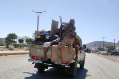 This photo taken on January 4, 2026 shows Saudi-backed forces deployed in the city of Mukalla in Yemen's coastal southern Hadramawt province. At least 80 troops from Yemen's secessionist Southern Transitional Council (STC) have been killed in fighting with Saudi-backed forces and strikes since January 2. At least 152 members of the UAE-backed STC forces were wounded, 130 were taken captive, and the fates of 500 fighters were still unknown, following the start of the operation on January 2. 