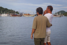 Two weeks on: Relatives of Spanish victims of the KM Putri Sakinah sinking pray on Jan. 8, 2026, at a dock in Labuan Bajo, West Manggarai, East Nusa Tenggara, on the 14th day of the search operation for the missing.  After previously locating three Spanish nationals who had been reported missing, a joint search and rescue team extended the operation at the request of the Spanish Embassy.