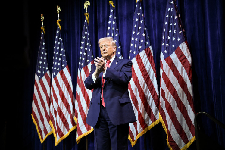 United States President Donald Trump claps after delivering his remarks on Jan. 6, 2026, at a House Republican Party retreat in Washington, D.C.