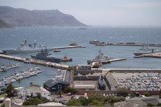 A general view of the Chinese guided-missile destroyer Tangshan (Hull 122) (left), the Stoykiy, the Iranian navy ship, the IRIS Makran 441 (second left), and the South African SAS Amatola (F145), (right) in Simon's Town harbour, near Cape Town, South Africa on Jan. 9, 2026. The Chinese lead Will For Peace 2026 exercise, which brings together navies from BRICS Plus countries for joint maritime safety operations.