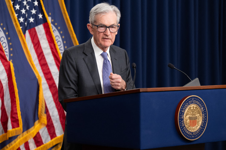US Federal Reserve Board Chairman Jerome Powell speaks during a news conference following a Federal Open Market Committee (FOMC) meeting in Washington, DC, on Dec. 10, 2025. 