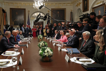 (Left-right) Prime Minister of Australia Anthony Albanese, US President Donald Trump and Secretary of War Pete Hegseth, White House Chief of Staff Susie Wiles and Australian Ambassador to the US Kevin Rudd (2nd R) speak to reporters ahead of a bilateral meeting in the Cabinet Room of the White House on October 20, 2025 in Washington, DC. 