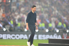 Real Madrid's Spanish coach Xabi Alonso reacts after the Spanish Super Cup final football match between FC Barcelona and Real Madrid at the King Abdullah Stadium&nbsp;in Jeddah on January 11, 2026. 