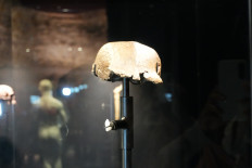 Unearthing origins: An ape-like skullcap discovered by Dutch geologist Eug&egrave;ne Dubois at Trinil in 1891 is displayed on Dec. 17, 2025, at the National Museum of Indonesia in Jakarta. The fossil is part of the permanent Early History exhibition introducing early human discoveries in Indonesia.