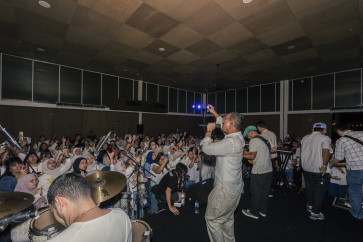 A choir of strangers: The Jakarta singing club where everyone belongs 