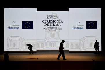 Workers set up the stage for the signing ceremony of the agreement between the European Union and Mercosur at the Gran Teatro Jose Asuncion Flores of Paraguay's Central Bank in Asuncion on January 16, 2026. The South American bloc Mercosur and the European Union will sign a deal on Jan. 17, 2026, 25 years in the making, to create one of the world's biggest free trade areas at a time of growing protectionism and volatility.