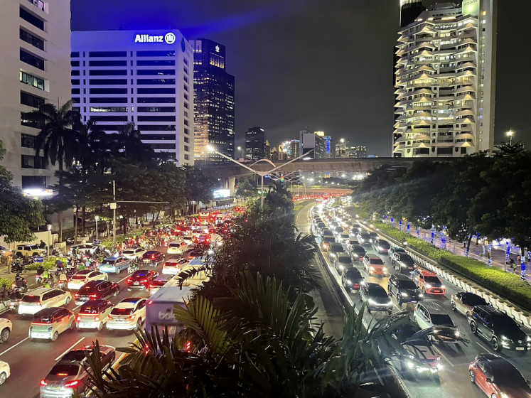 After-hours rush: Traffic continues well into the night on Jl. Jend. Sudirman, one of Jakarta&rsquo;s busiest thoroughfares, pictured during the evening peak on Dec. 11, 2025.