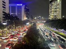 After-hours rush: Traffic continues well into the night on Jl. Jend. Sudirman, one of Jakarta&rsquo;s busiest thoroughfares, pictured during the evening peak on Dec. 11, 2025.