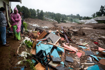 Debris from destroyed houses remains after a landslide struck in Pasirlangu village in West Bandung regency, West Java, on January 24, 2026, as the National Search and Rescue Agency (Basarnas) said eight people were killed and 82 remain missing. 