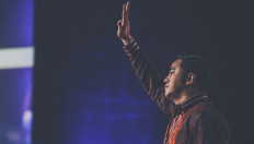 Provocative charges: Prominent Indonesian comic Pandji Pragiwaksono is seen waving in this undated photograph.