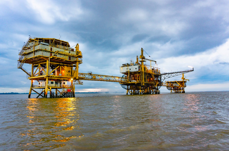 Three offshore platforms linked by bridges operate in the Malacca Strait, which are operated by PT Energi Mega Persada, in an undated photo.