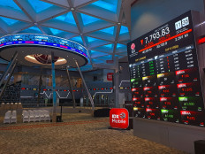 In the red: Stocks are shown on a digital screen on Jan. 29, 2026 in the Indonesia Stock Exchange's (IDX) main hall in South Jakarta.