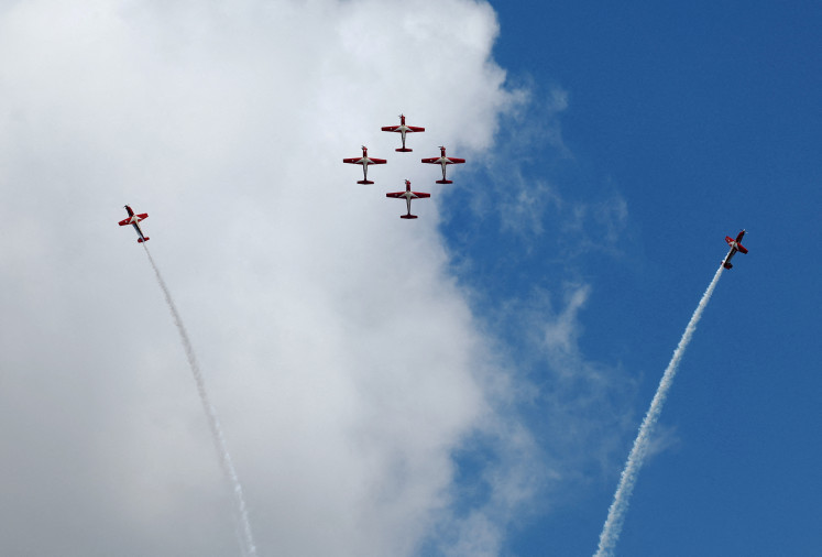 Indonesian Air Force's Jupiter Aerobatic Team performs in their KT-1Bs during an aerial display at the Singapore Airshow at Changi Exhibition Center, in Singapore, Feb. 20, 2024. The biennial event is held on Feb. 3-8, 2026