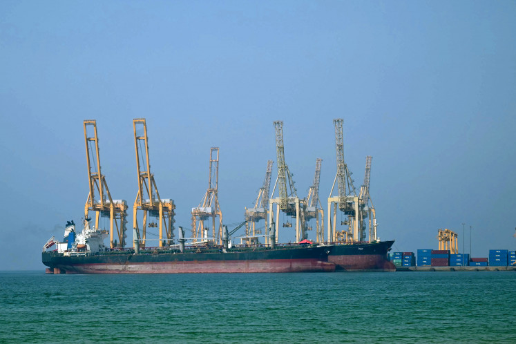 Tankers are seen at the Khor Fakkan Container Terminal, the only natural deep-sea port in the region and one of the major container ports in the Sharjah Emirate, along the Strait of Hormuz, a waterway through which one-fifth of global oil output passes, on June 23, 2025.