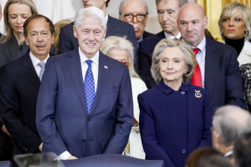 Former US President Bill Clinton and former US Secretary of State Hillary Clinton arrive for Donald Trump's inauguration as the next President of the United States in the Rotunda of the United States Capitol in Washington, US, January 20, 2025. 